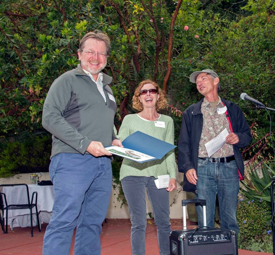 Noreen Weeden and Eddie Bartley present Glen Tepke with his award / Photo by Nancy Johnston